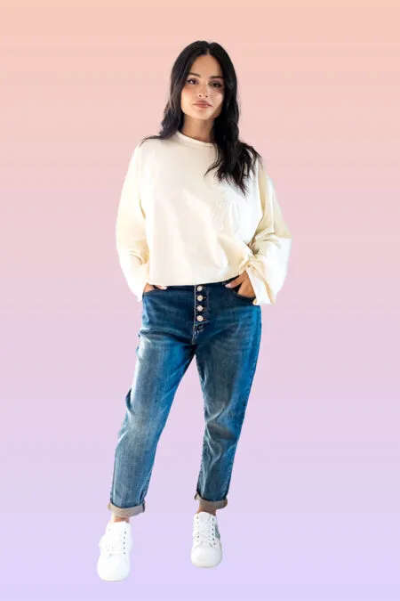 maglia over con fiocco a paillettes